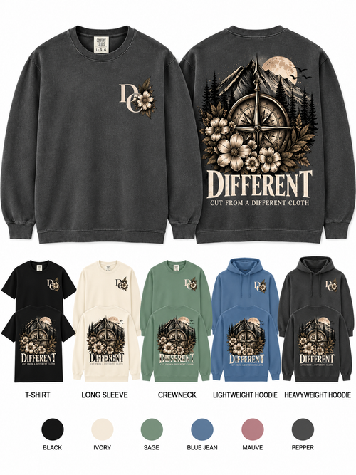 Different Cloth Co. Comfort Colors apparel featuring a mountain, compass and floral design with Different and Cut From a Different Cloth lettering.