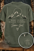 More Peace Bigger Purpose by Different Cloth Co. on Sage apparel featuring mountain back artwork with a matching front chest design.