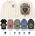 Unbreakable Still Standing Comfort Colors apparel by Different Cloth Co. featuring a rustic heart and cross design with Grace Held Me Together artwork.