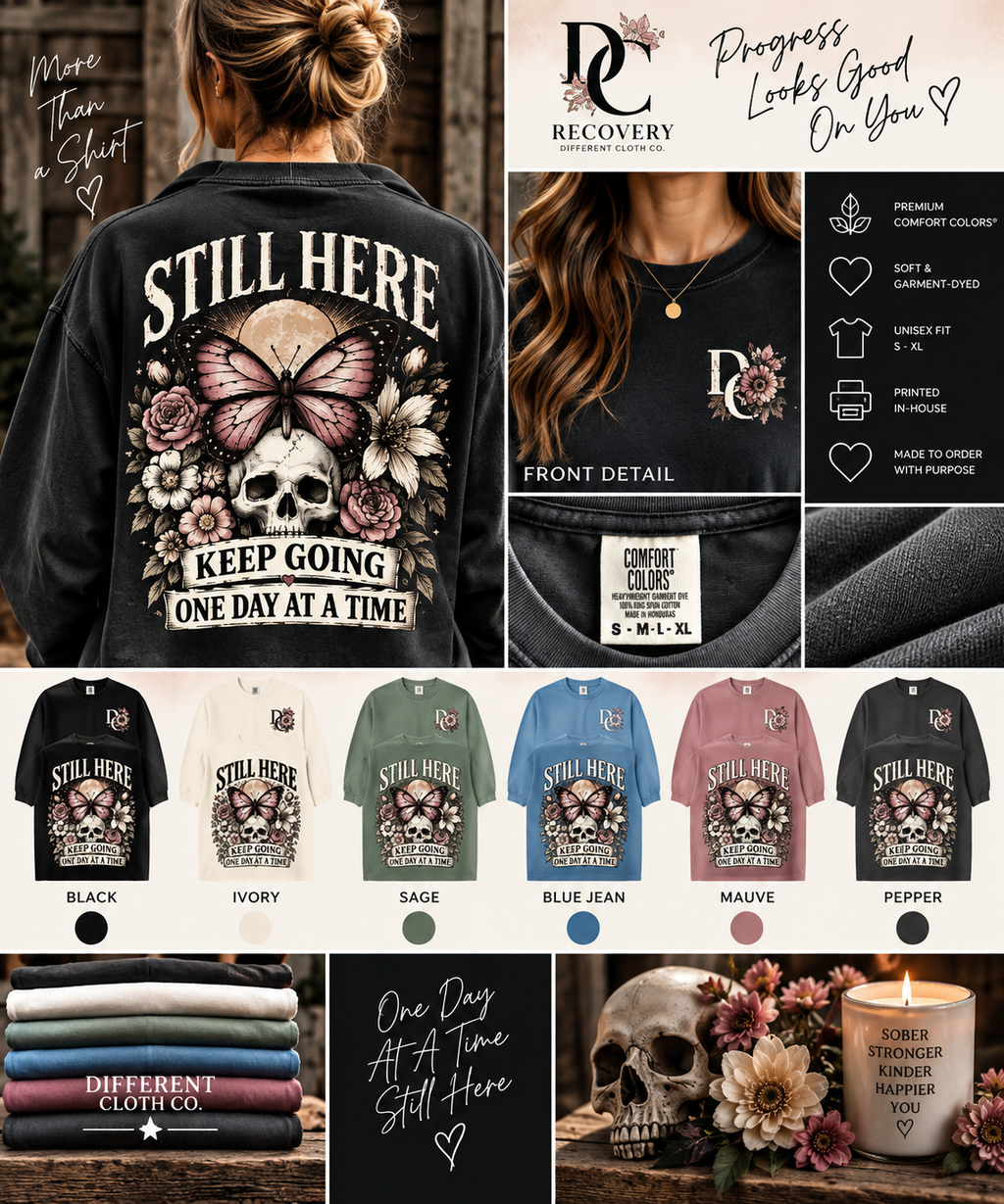 Different Cloth Co. Still Here recovery apparel with butterfly, skull and floral design, Keep Going One Day at a Time message, front detail and available colors